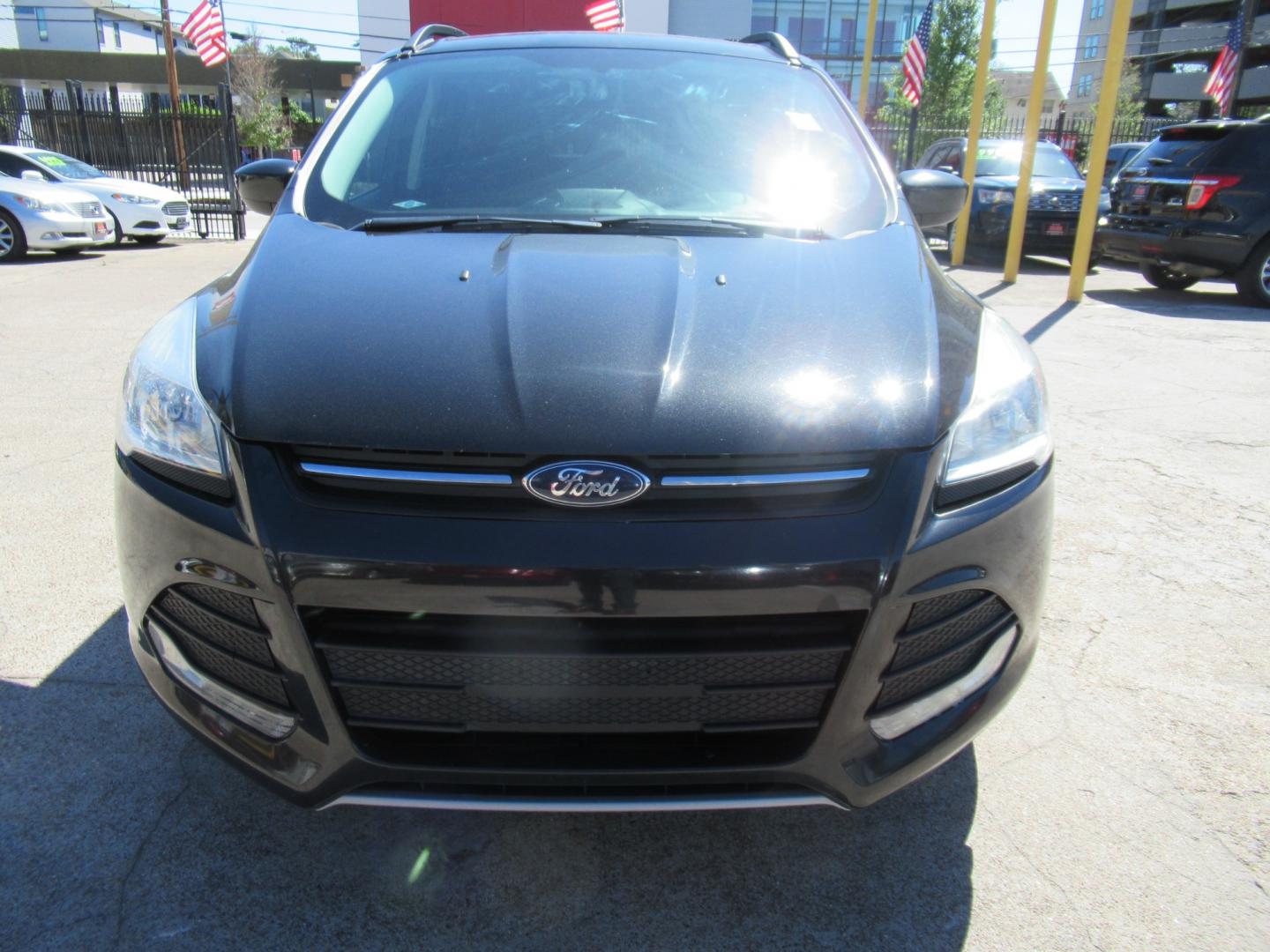 2014 Black /Black Ford Escape SE 4WD (1FMCU9GX5EU) with an 1.6L L4 DOHC 16V engine, Automatic transmission, located at 1511 North Shepherd Dr., Houston, TX, 77008, (281) 657-1221, 29.798361, -95.412560 - 2014 FORD ESCAPE SE VIN: 1FMCU9GX5EUC37295 1 F M C U 9 G X 5 E U C 3 7 2 9 5 4 DOOR WAGON/SPORT UTILITY 1.6L I4 F DOHC 16V GASOLINE FRONT WHEEL DRIVE W/ 4X4 - Photo#20